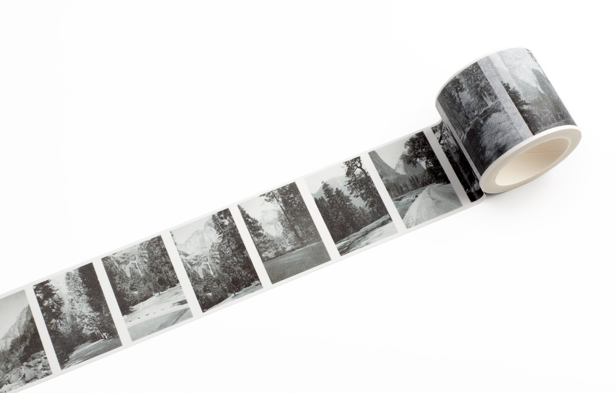 Roll of tape with black and white landscape images from Yosemite on a white background