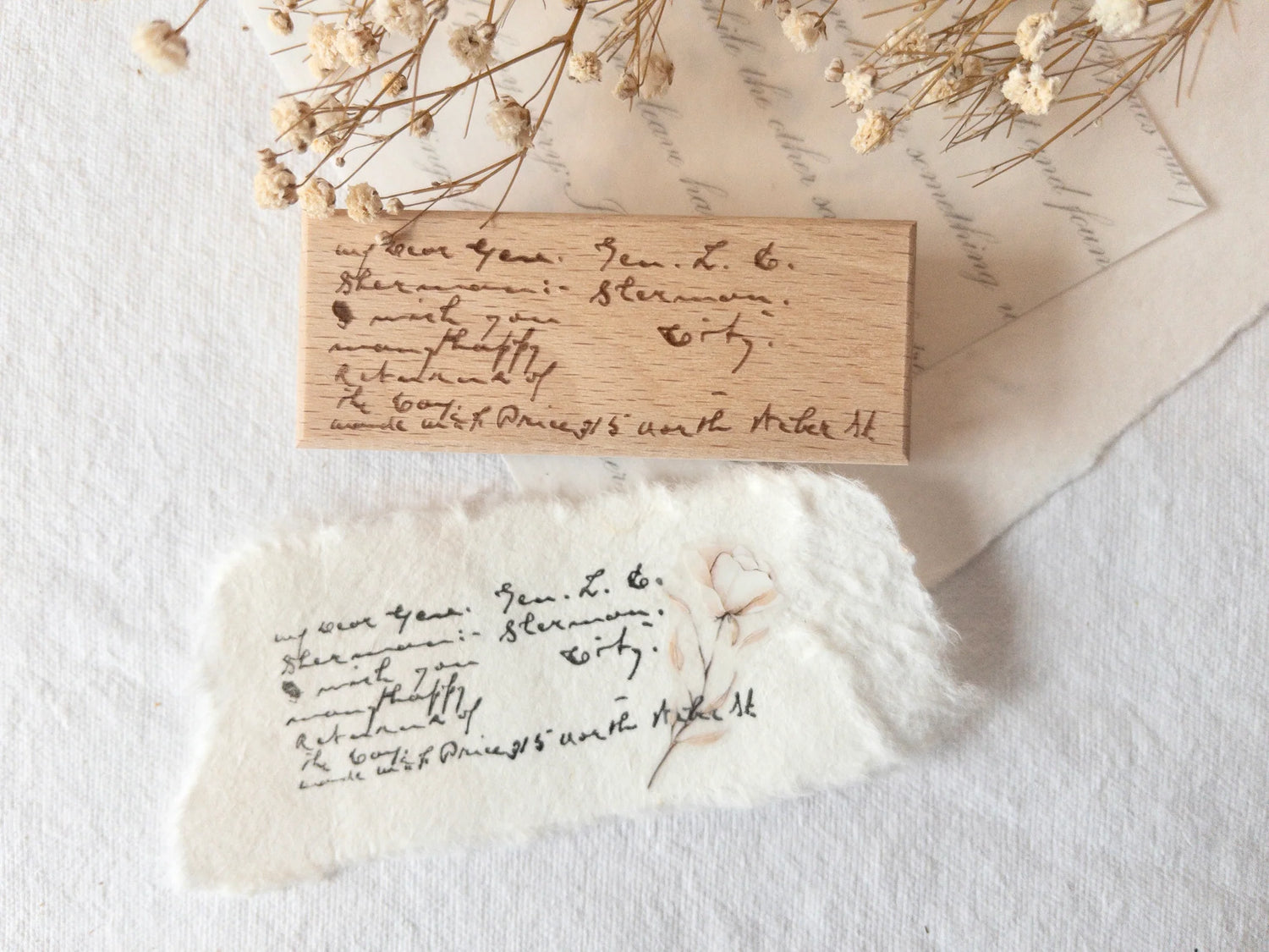 Wood-mounted stamp with vintage script text