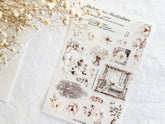 Sheet of cozy floral illustrations on a textured surface with dried flowers.