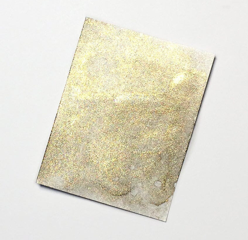 Sheet of gold paper on a white background