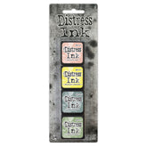 Packaging of Distress Ink with four ink pads on a textured gray background
