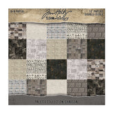 Packaging of Tim Holtz Idea-ology paper pack with charcoal design on a white background