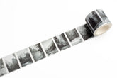 Roll of tape with black and white landscape images from Yosemite on a white background