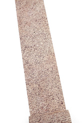 A brown washi tape printed with a dense, cursive script pattern resembling vintage handwriting, shown against a plain white background.