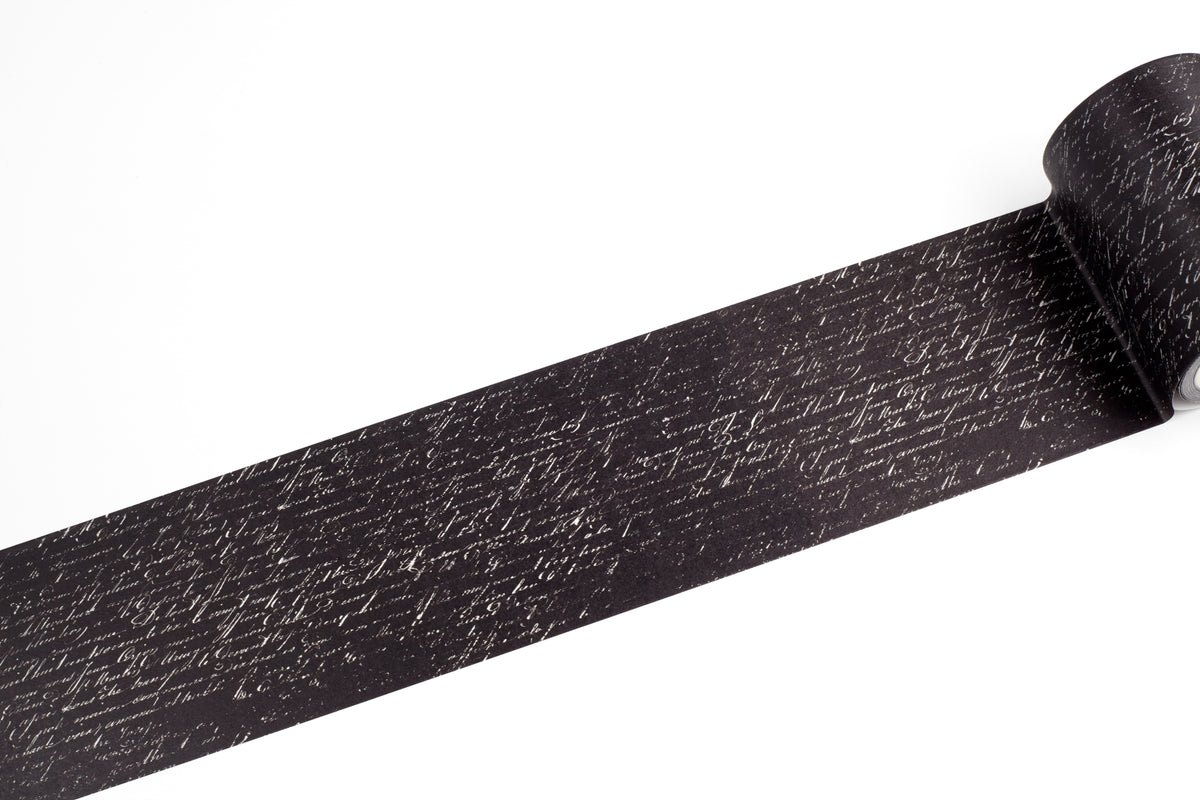 A roll of black tape with a white cursive handwriting, shown partially unrolled on a plain white background.