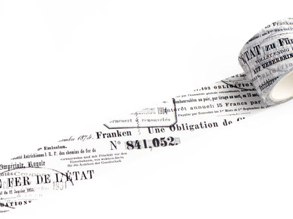 A roll of decorative tape featuring black French text and numbers printed on a white background, shown against a clean white backdrop.