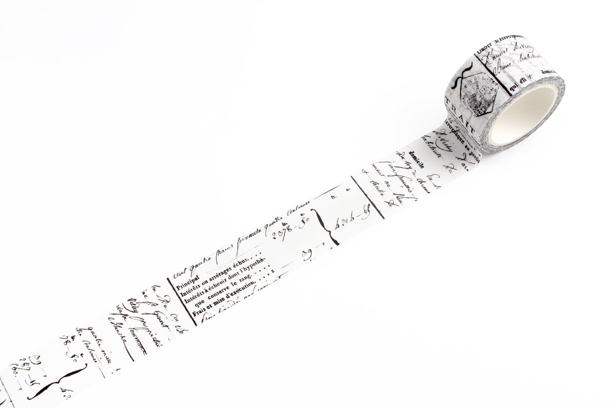 A roll of decorative washi tape with a black script and sketch pattern on a white background, shown partially unrolled on a clean white surface.