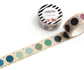 A roll of washi tape with showing multiple circular color swatches in shades of blue, green, teal, and purple on a white background.
