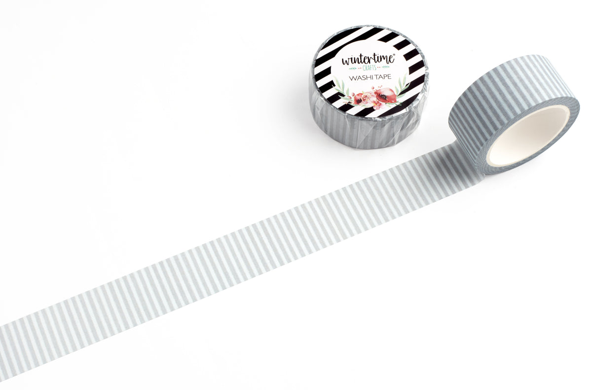 A roll of gray and white striped washi tape shown on a clean white background.