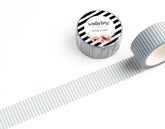 A roll of washi tape with a gray and white striped pattern, shown partially unrolled on a clean white background. The top of the roll features a circular label with black and white diagonal stripes, the brand name &