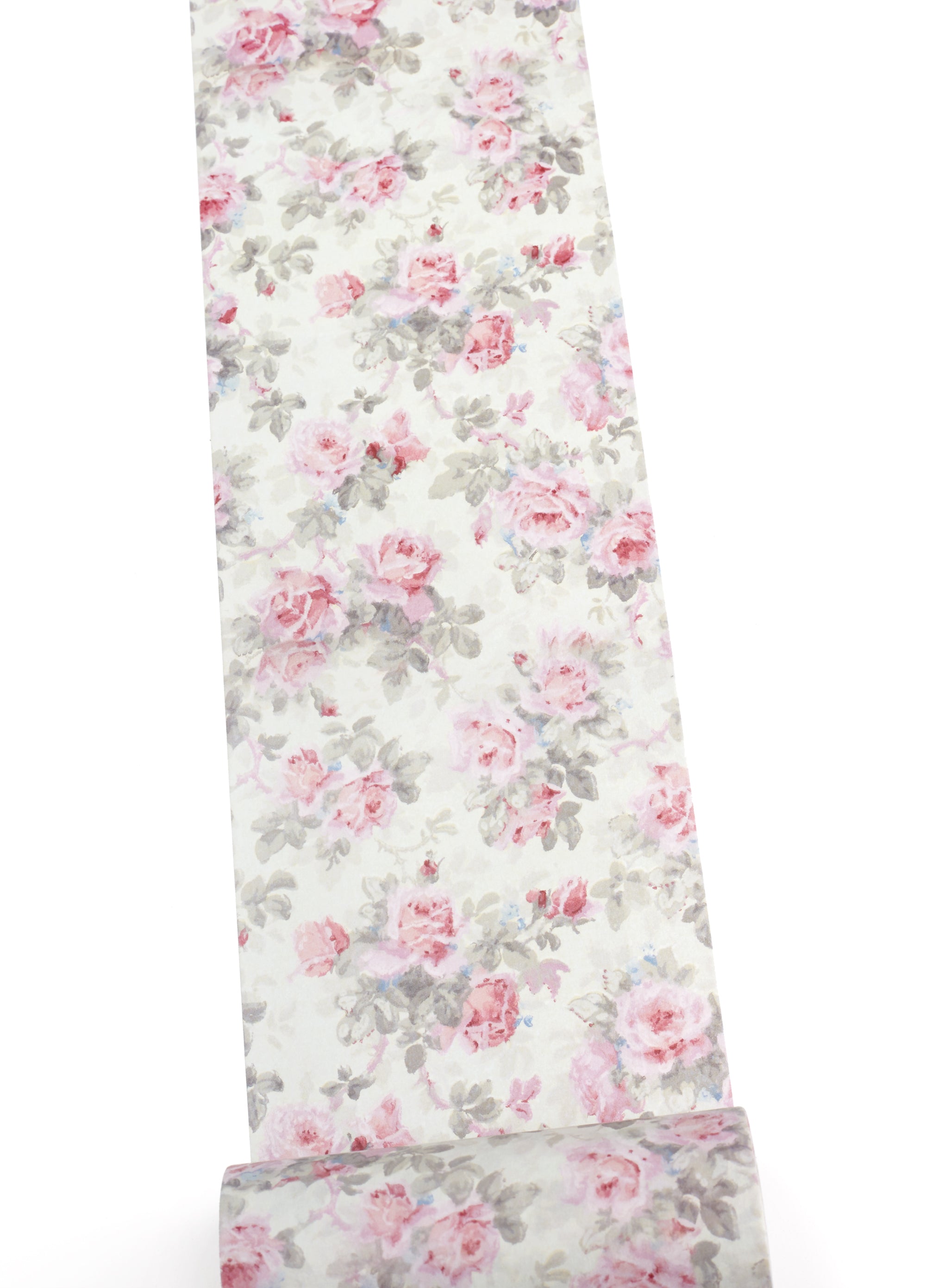 A roll of washi tape with a vintage floral print of pink roses and gray-green leaves on a white background, shown against a plain white backdrop.