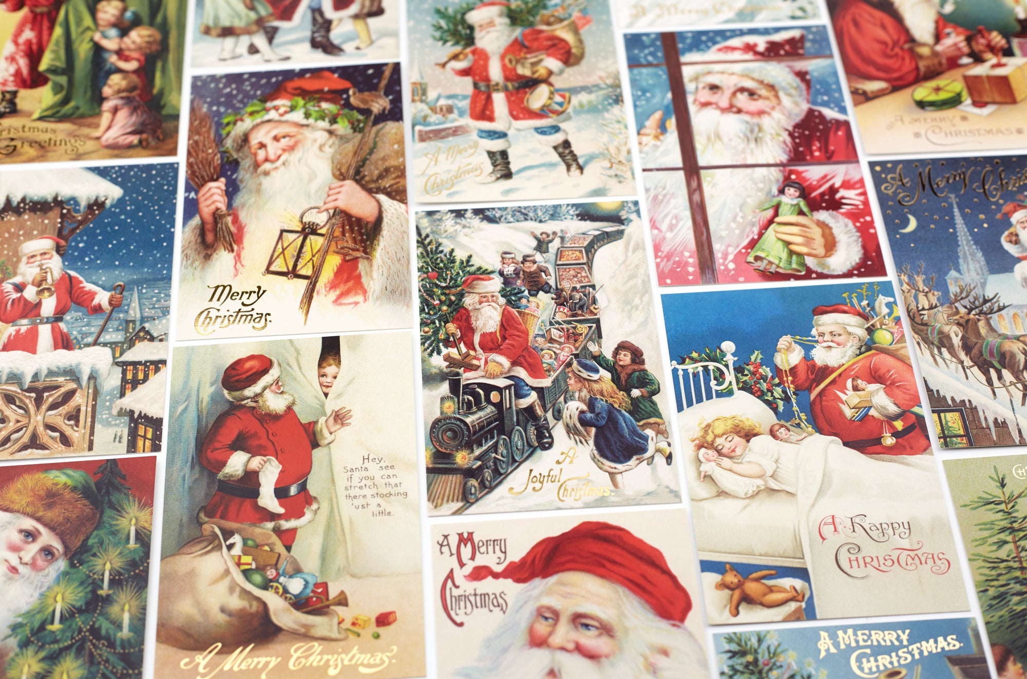 A collage of vintage Christmas postcards featuring Santa Claus in various holiday scenes, with &