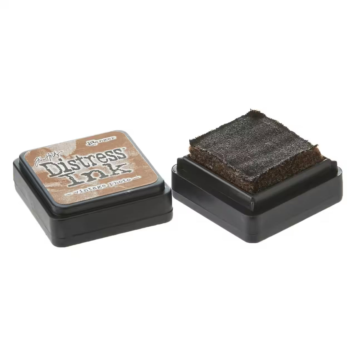 Tim Holtz Distress Ink stamp pads on a white background, showing the dark brown ink pad.